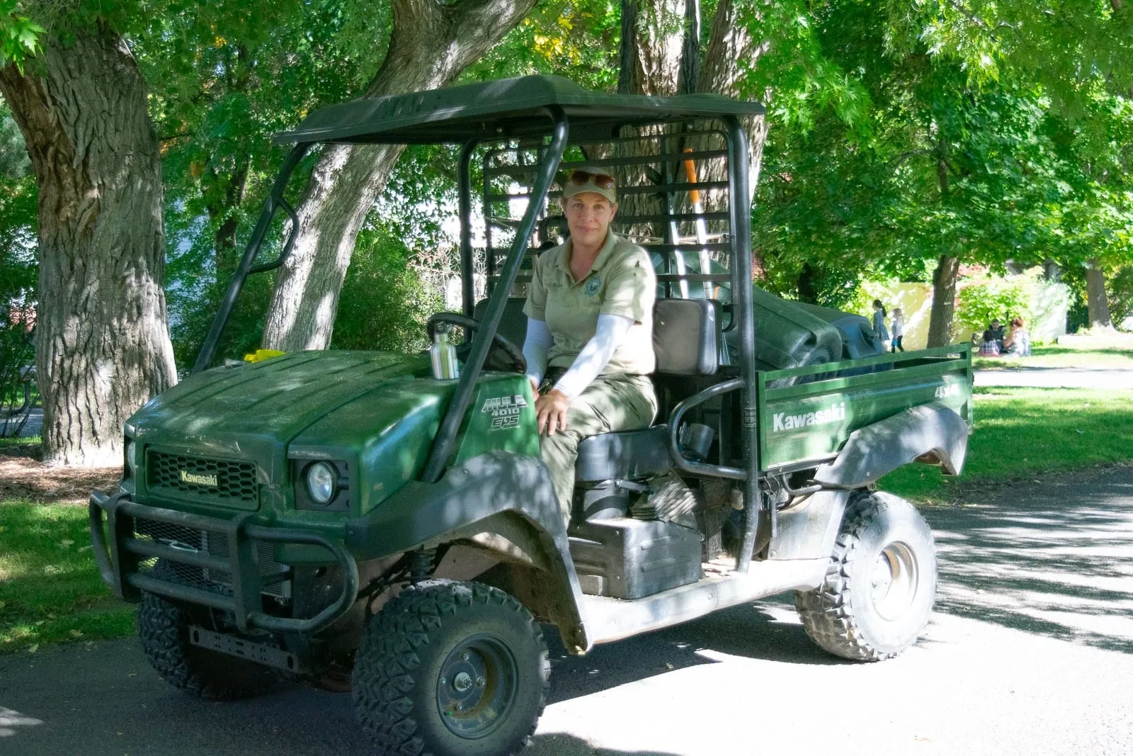 Guardian of the Wilderness — Park Ranger Patrolling in Terrain Vehicle
